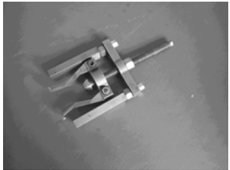 Flywheel gripper and flywheel puller tools