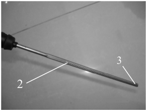 Oil dipstick with high and low position marks close-up