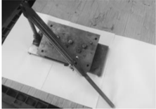 Valve spring compressor removing intake and exhaust valves