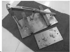 Valve spring compressor removing intake and exhaust valves