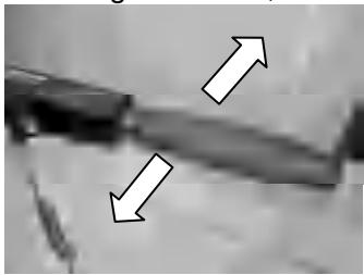 Moving tiller handle left or right to change direction