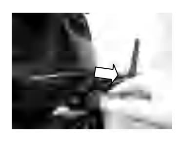 Disconnecting fuel line from outboard motor