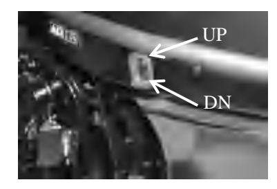 Press DN switch for electric tilt down