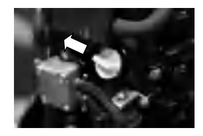 Oil draining from engine into container