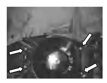 Starter cover removed showing flywheel