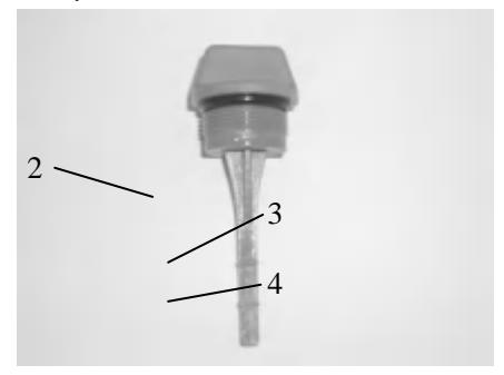 Oil dipstick showing upper and lower level marks