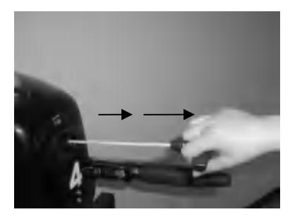 Pulling manual starter handle to start engine