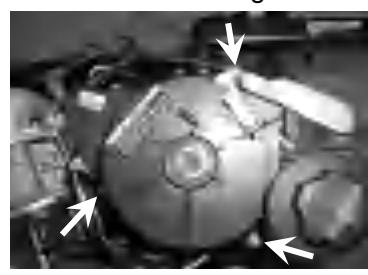 Removing starter by unbolting three bolts