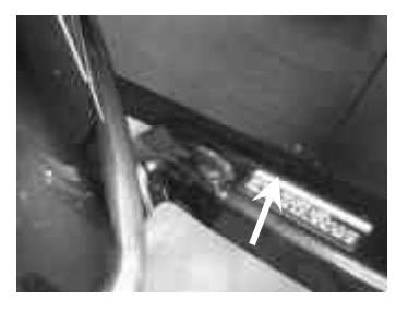 Throttle friction adjuster on tiller handle
