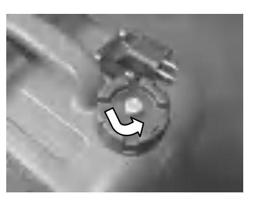 Loosening air vent screw on fuel tank cap