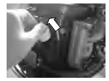 Draining engine oil into container