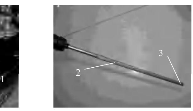 Oil level upper and lower marks on dipstick