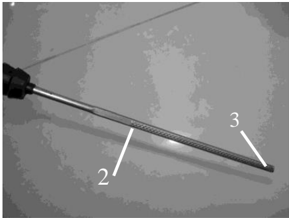 Oil dipstick high and low mark detail