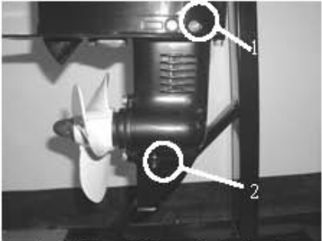 Lower unit oil level plug and drain plug locations