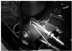 Throttle cable adjusting screw location