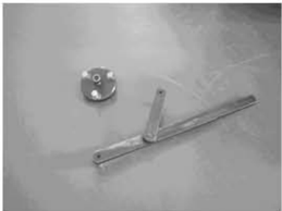 Flywheel removal using flywheel holder and puller