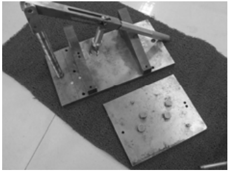 Cylinder cover disassembly - removing valve components